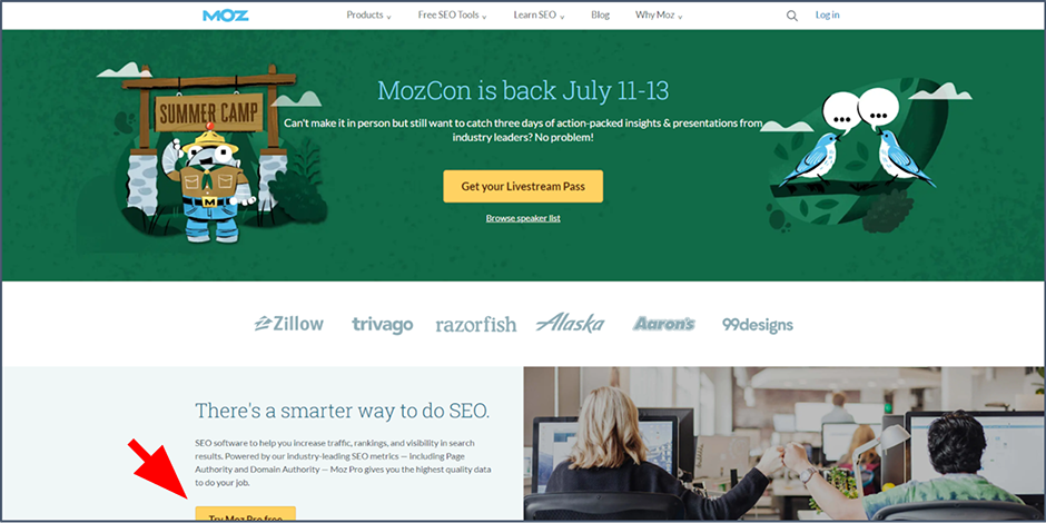 A screenshot of the MozCon homepage, as seen on desktop. An arrow points to a button that is being cut off.